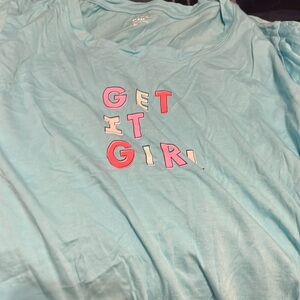 Light blue T-shirt “get it girl” from love by gap
A women’s medium
-